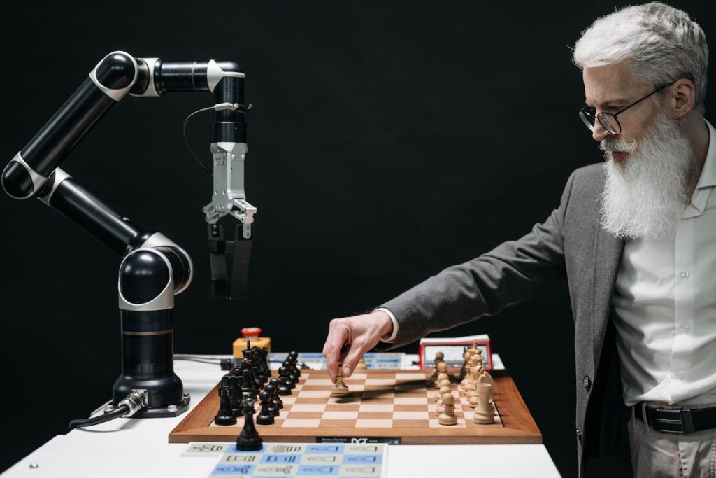 a-bearded-man-playing-chess-8438923 A bearded man strategically moves chess pieces while an AI robot arm assists in a futuristic game.